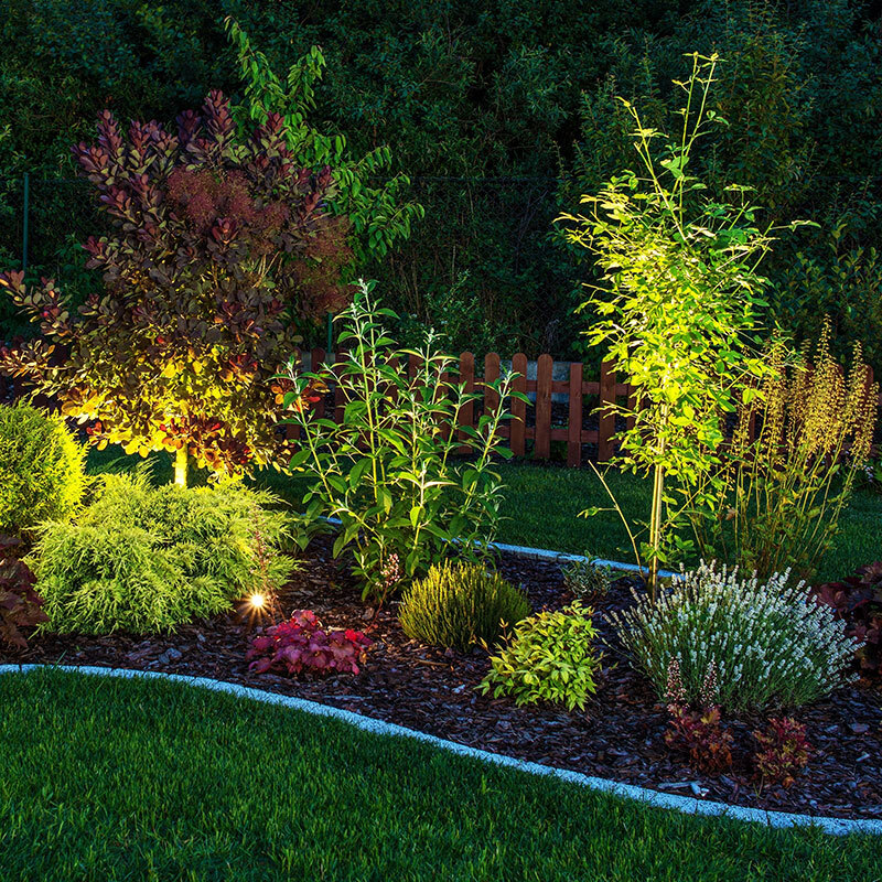 Nighttime water feature landscape lighting